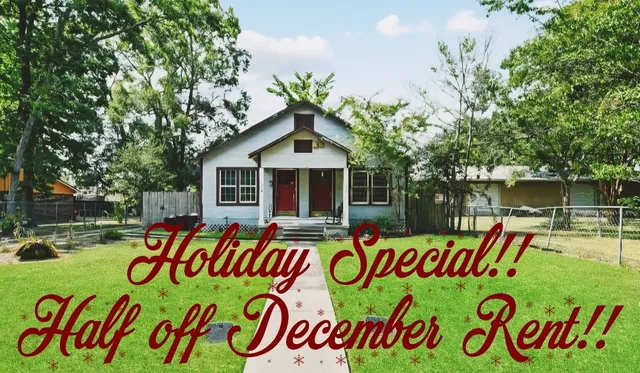 a view of a wooden dinning table and chairs in the garden