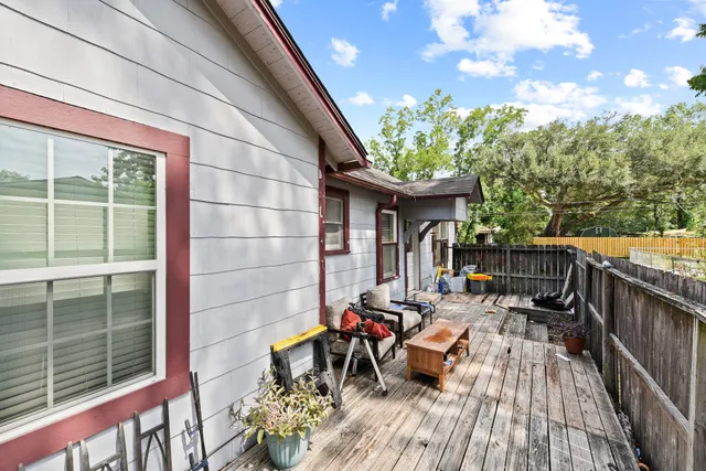 a view of a chairs and tables in the balcony
