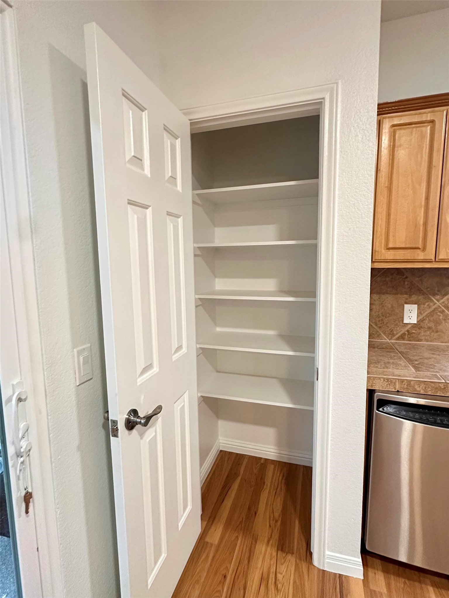 1122 Mansell Avenue Austin, TX 78721 - Photo 5 of 29 a view of walk in closet with empty racks