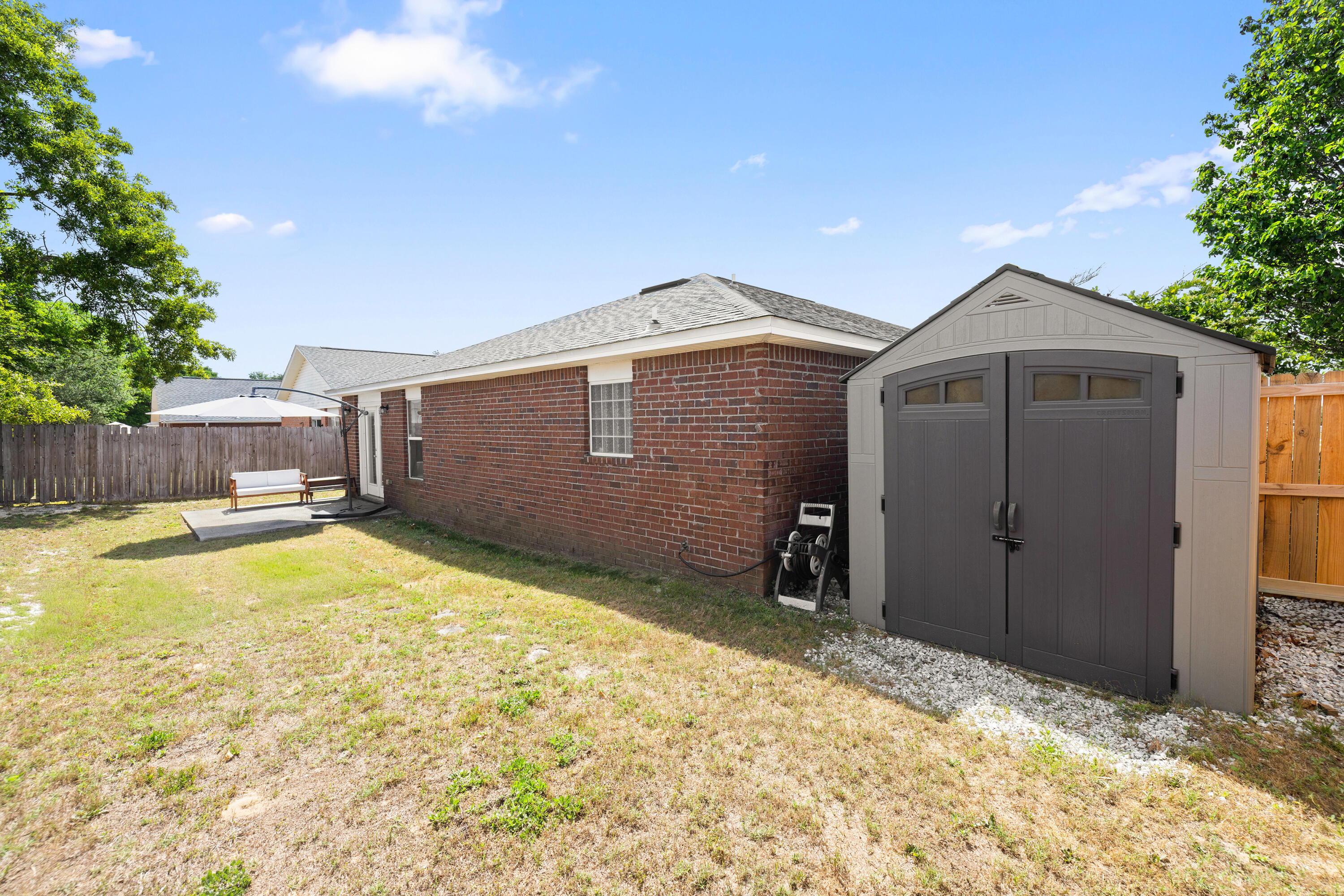 202 Limestone Circle Crestview, FL 32539 - Photo 39 of 49 a view of a backyard
