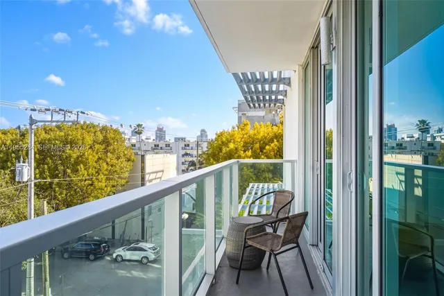a view of balcony with furniture