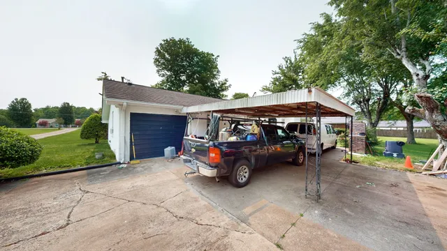 a car parked in front of a house