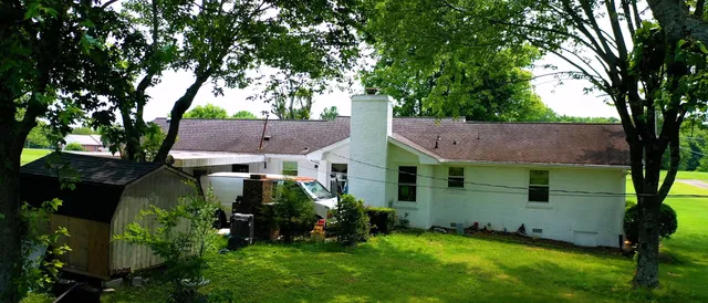 front view of a house with a small yard
