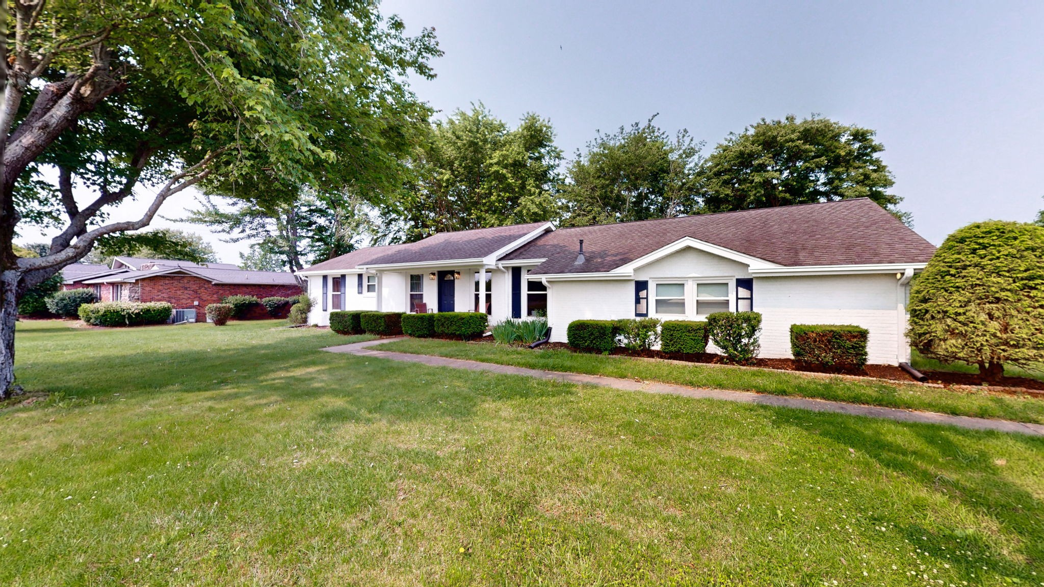 7181 Bidwell Road Joelton, TN 37080 - Photo 4 of 33 a front view of a house with a yard