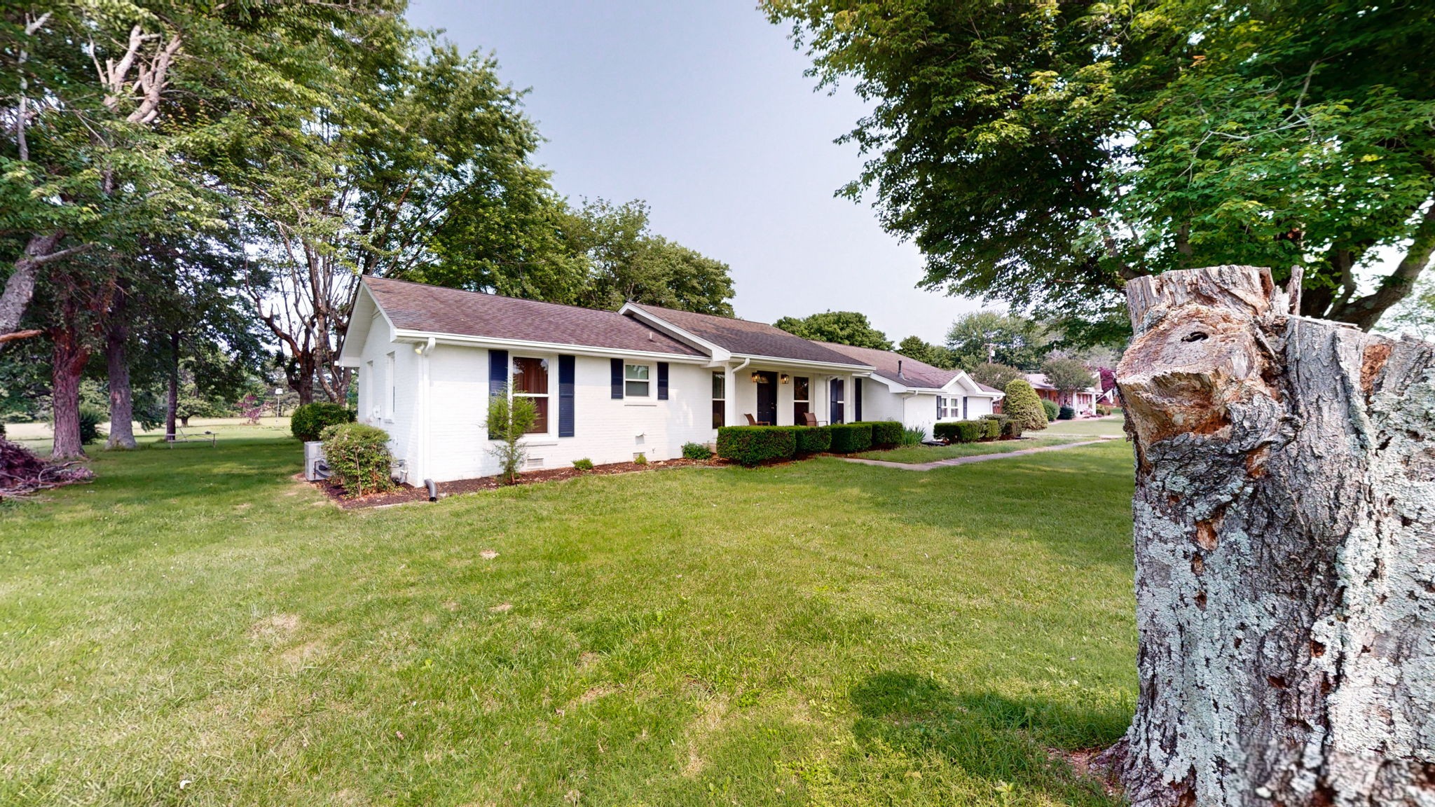 7181 Bidwell Road Joelton, TN 37080 - Photo 5 of 33 a front view of a house with a garden