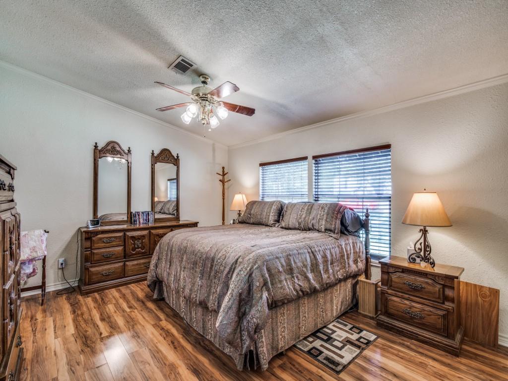 233 Esquire Estates Road Mabank, TX 75156 - Photo 14 of 34 a bed room with a bed and dresser