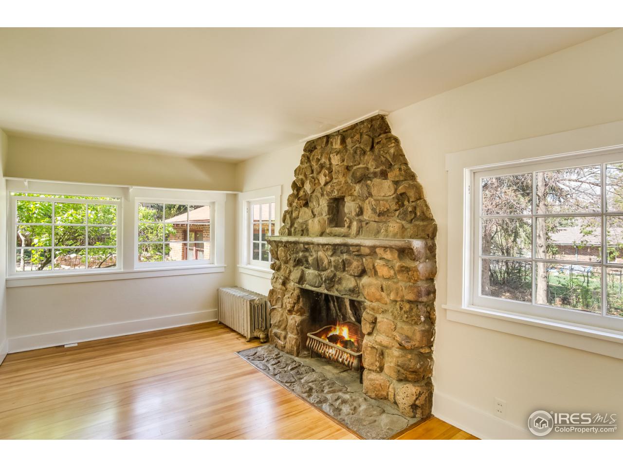 747 12th Street Boulder, CO 80302 - Photo 17 of 25 a front view of a house with a fireplace