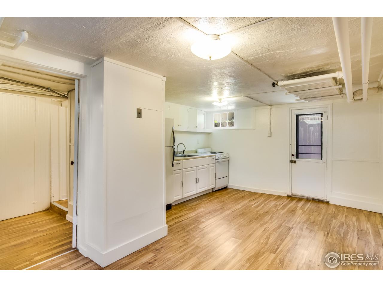 747 12th Street Boulder, CO 80302 - Photo 18 of 25 a view of a kitchen with wooden floor