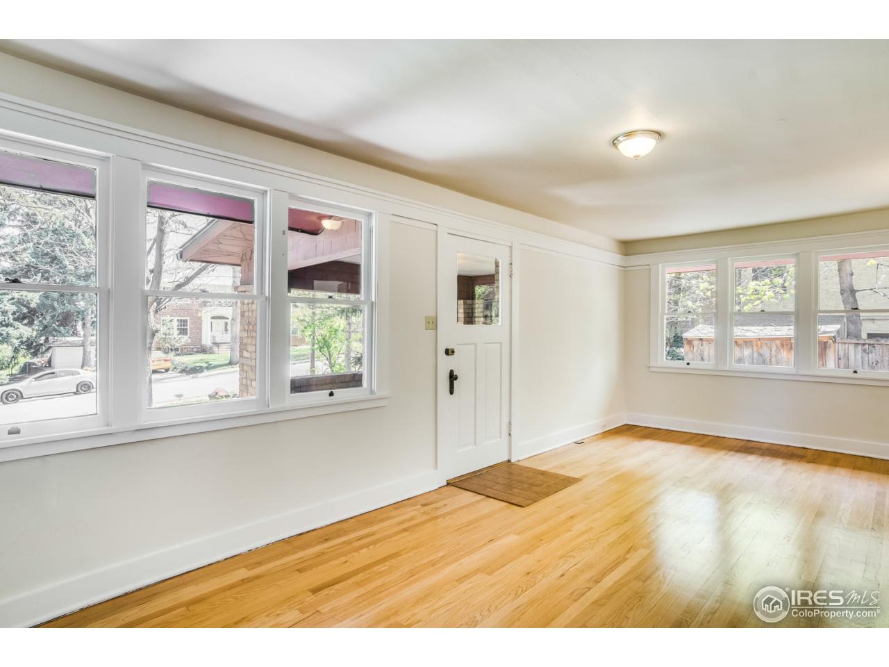 747 12th Street Boulder, CO 80302 - Photo 2 of 25 a view of an empty room with a window