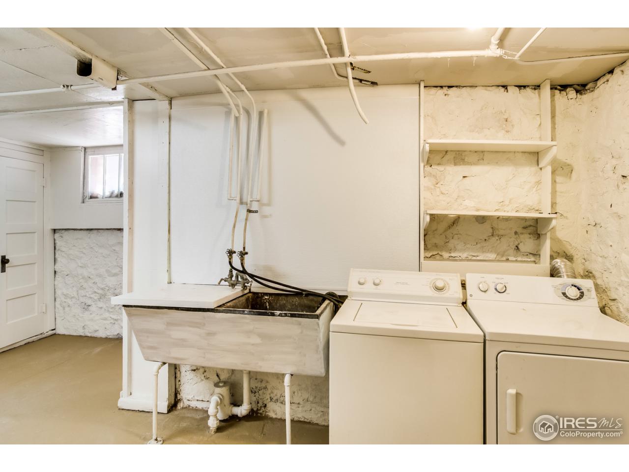 747 12th Street Boulder, CO 80302 - Photo 24 of 25 a utility room with dryer and washer