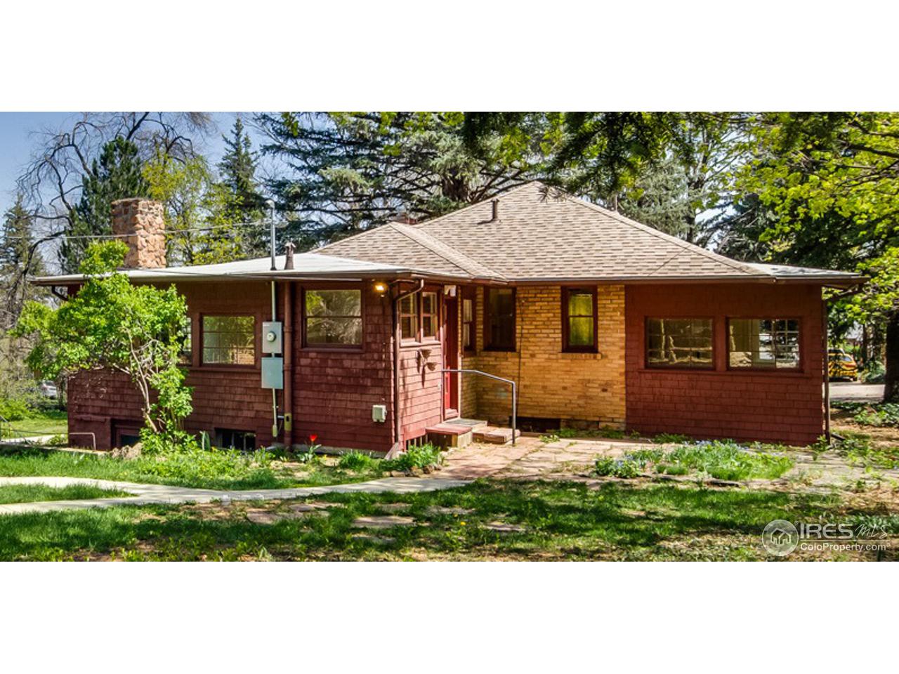 747 12th Street Boulder, CO 80302 - Photo 25 of 25 a front view of a house with a garden