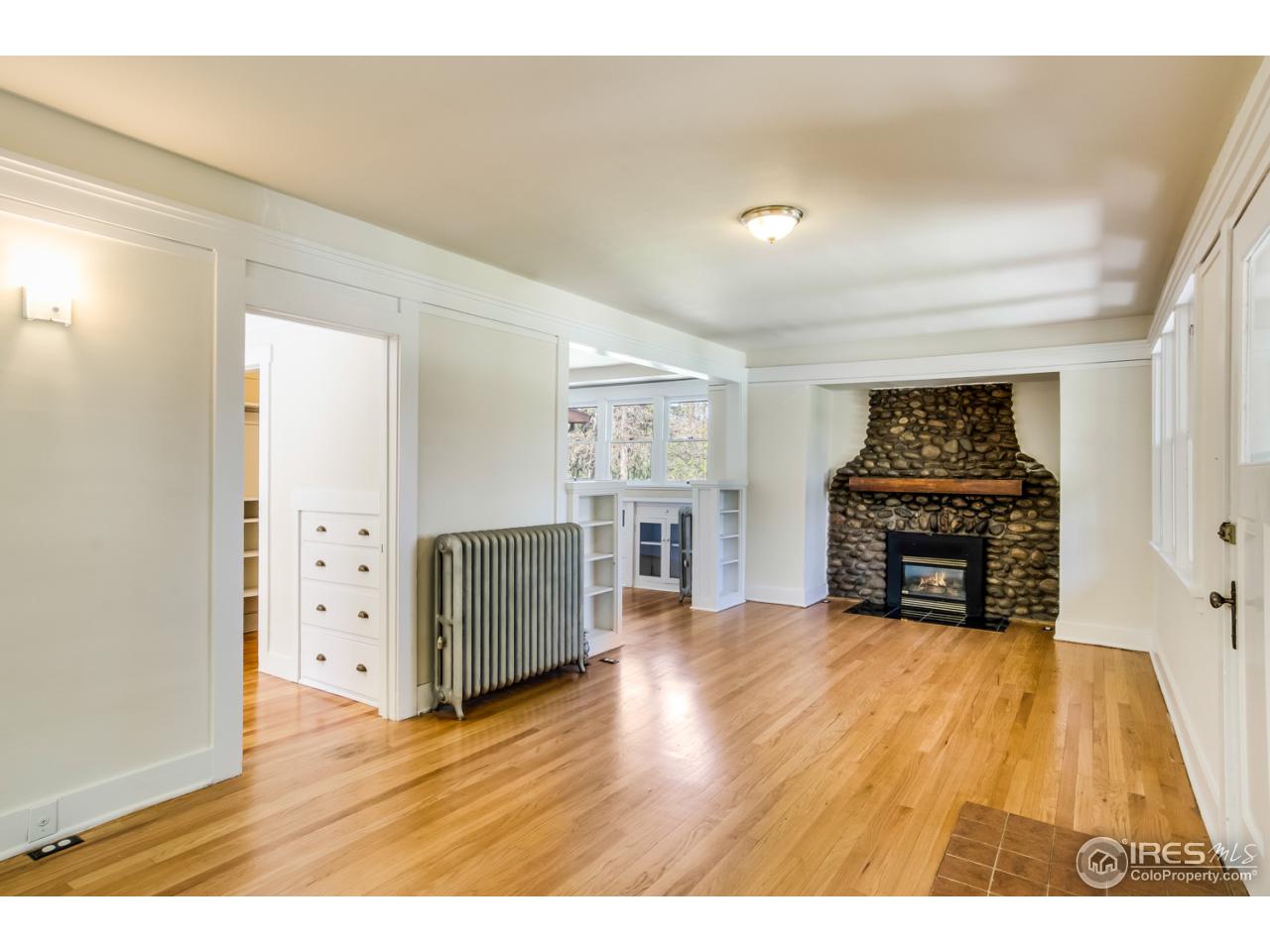 747 12th Street Boulder, CO 80302 - Photo 3 of 25 a view of empty room with wooden floor