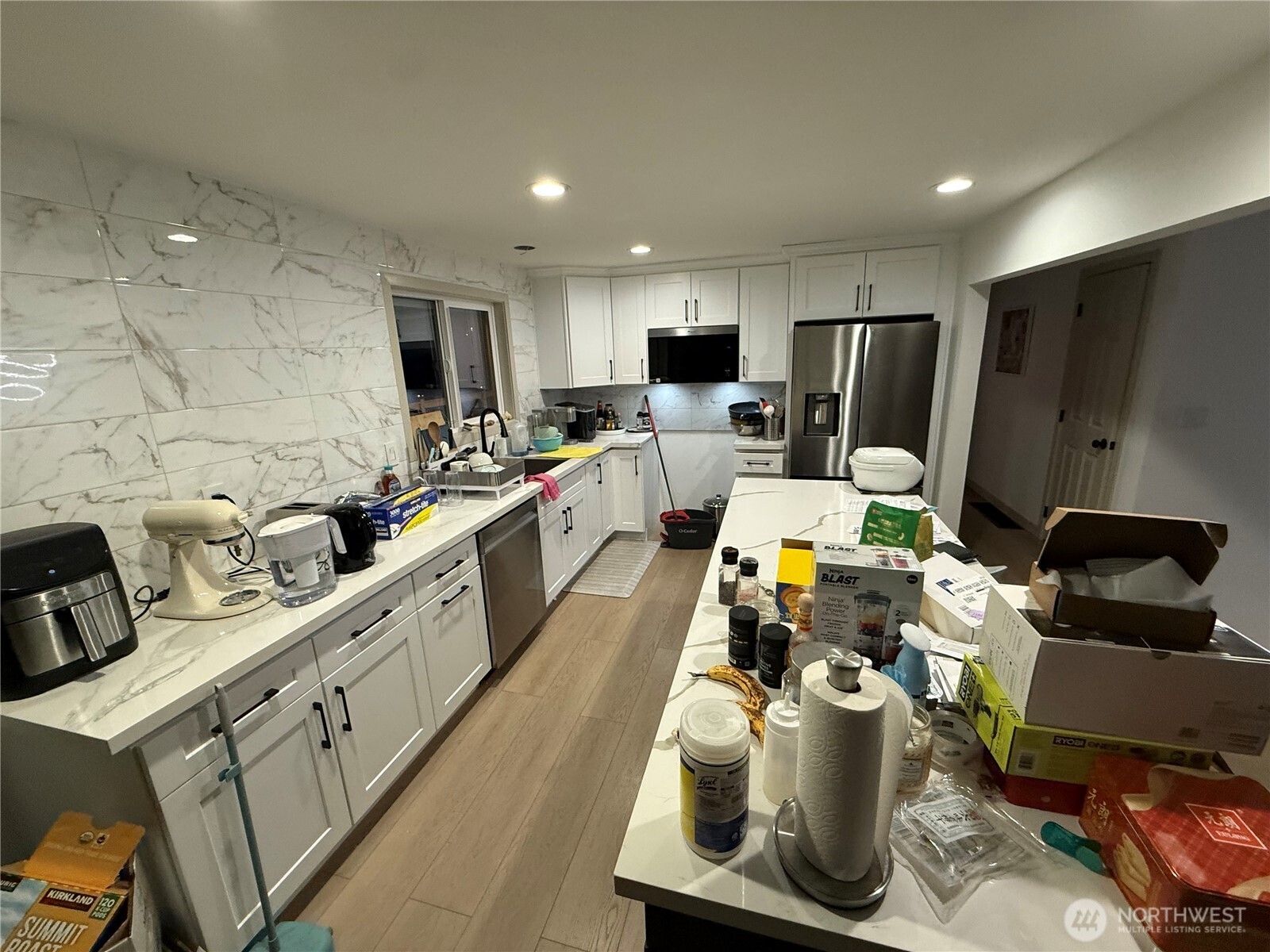 26005 156th Street Southeast Covington, WA 98042 - Photo 2 of 24 a large kitchen with lots of appliances