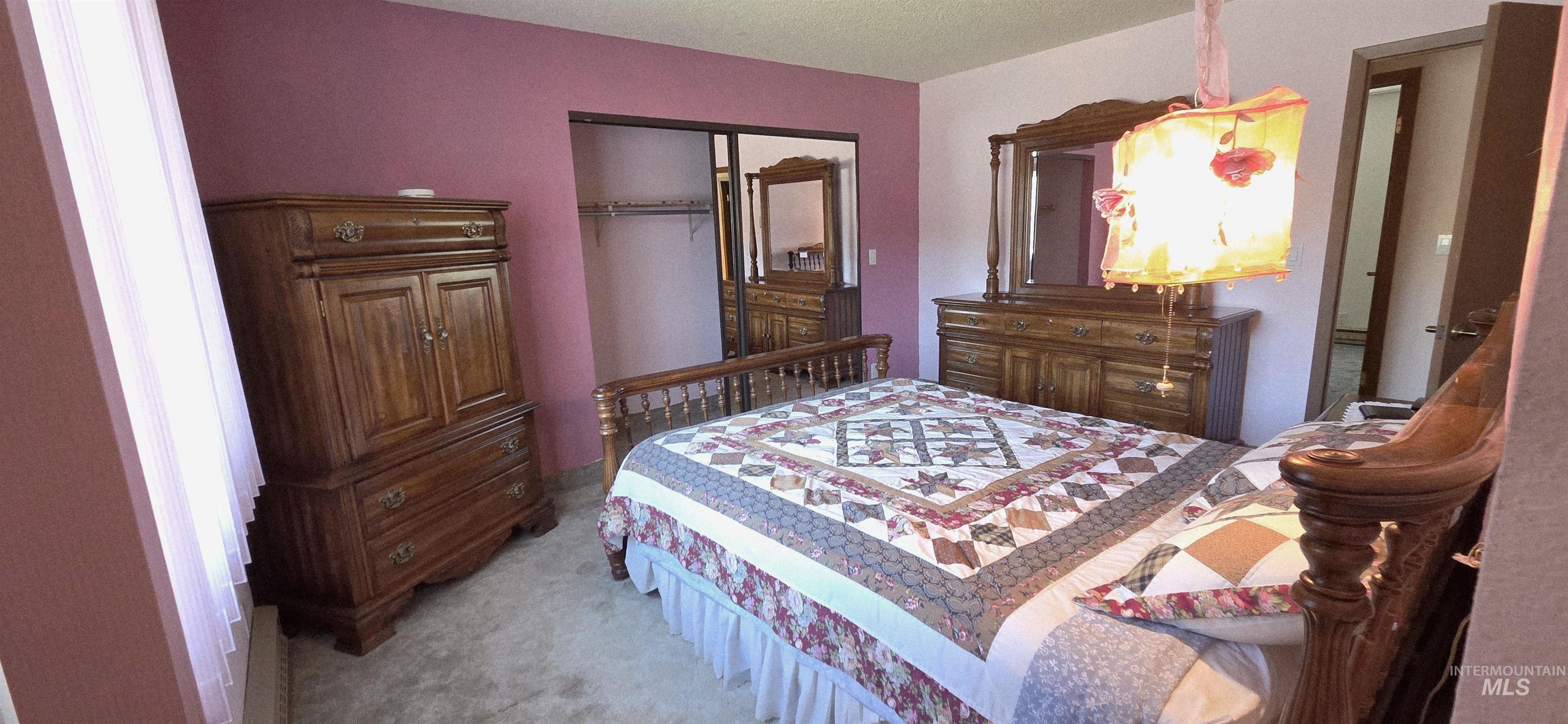 1902 Arlington Street Pomeroy, WA 99347 - Photo 24 of 27 Bedroom with a closet and light colored carpet
