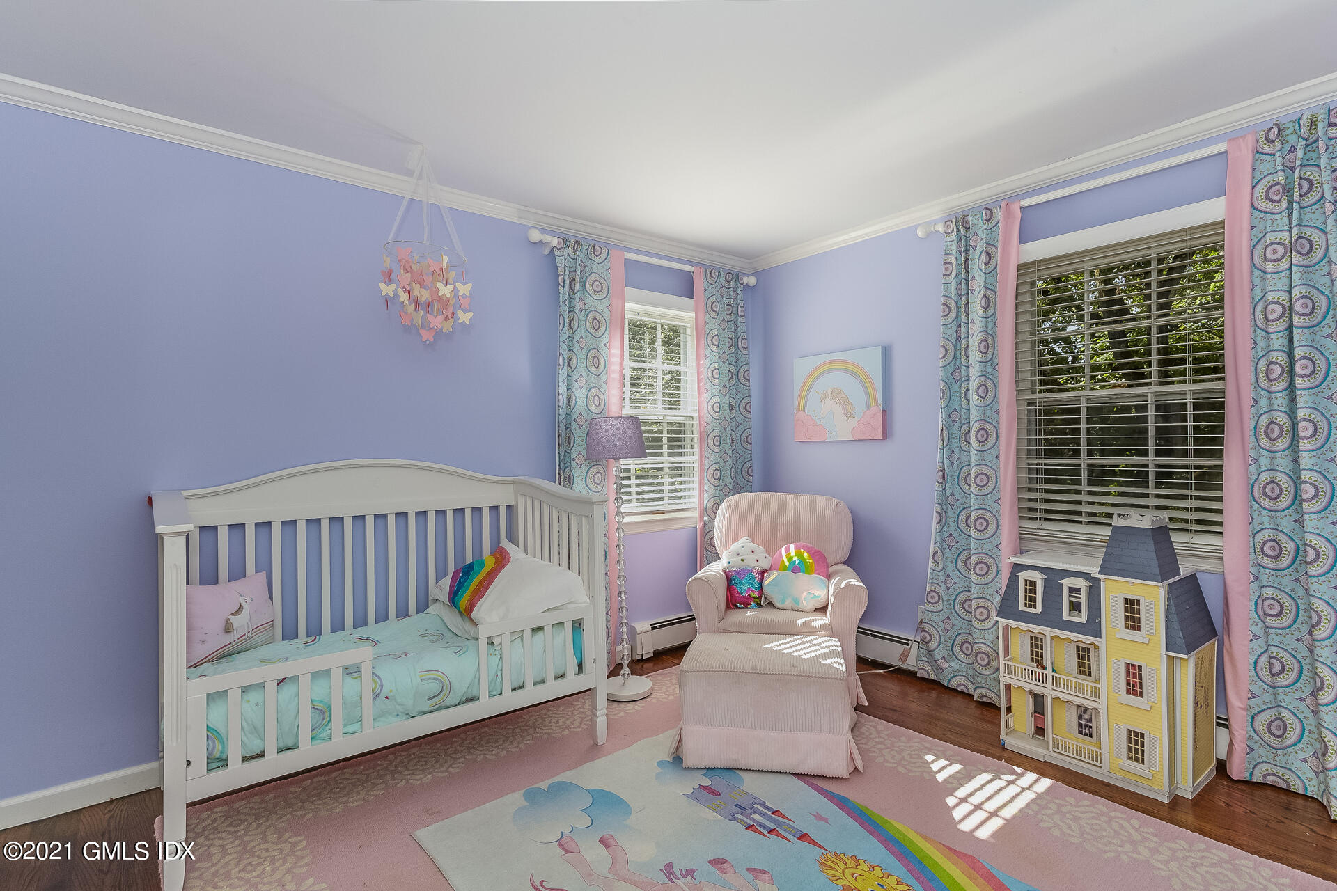 27 Perryridge Road Greenwich, CT 06830 - Photo 14 of 24 a bedroom with furniture and a window