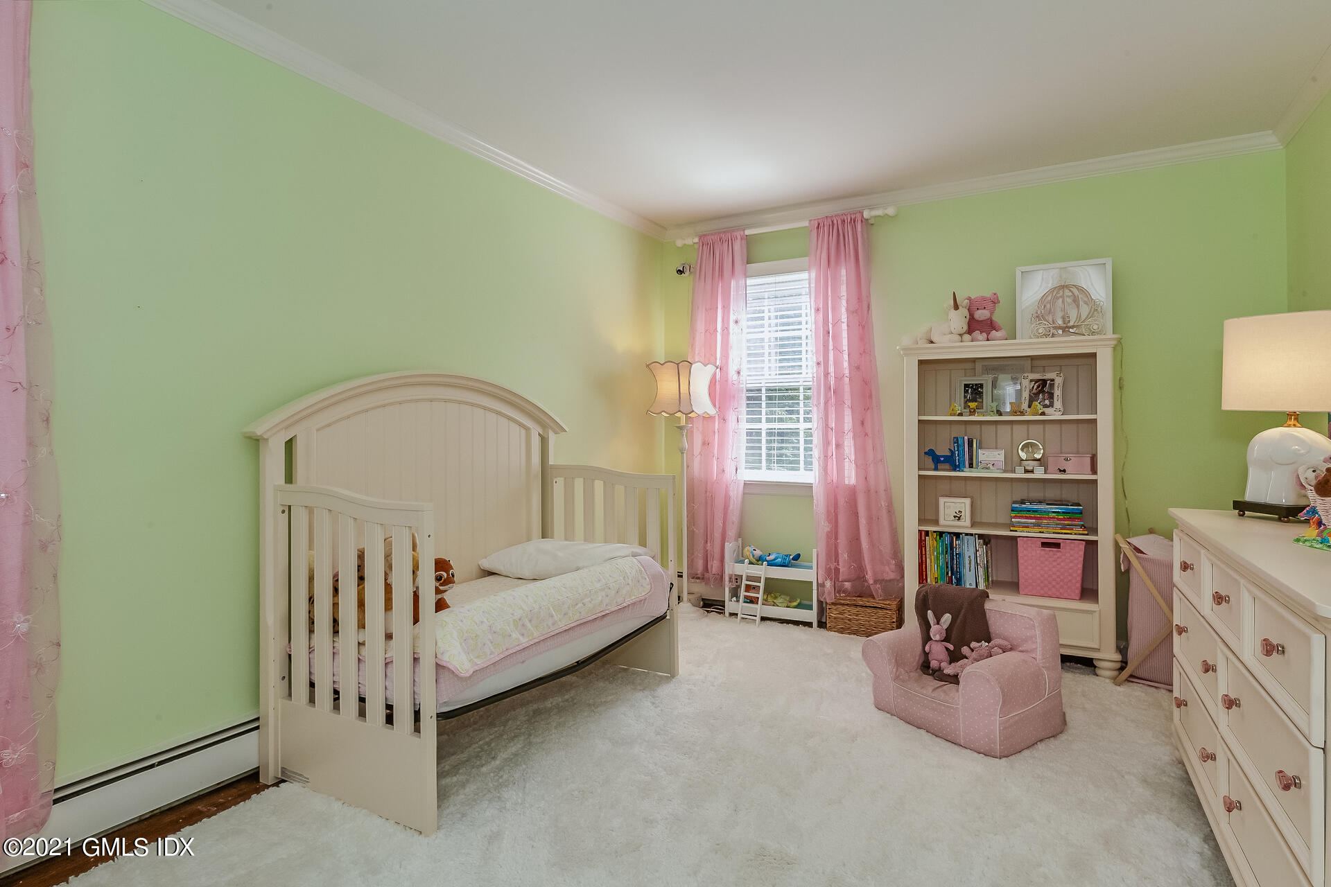 27 Perryridge Road Greenwich, CT 06830 - Photo 15 of 24 a bedroom with furniture and a large window