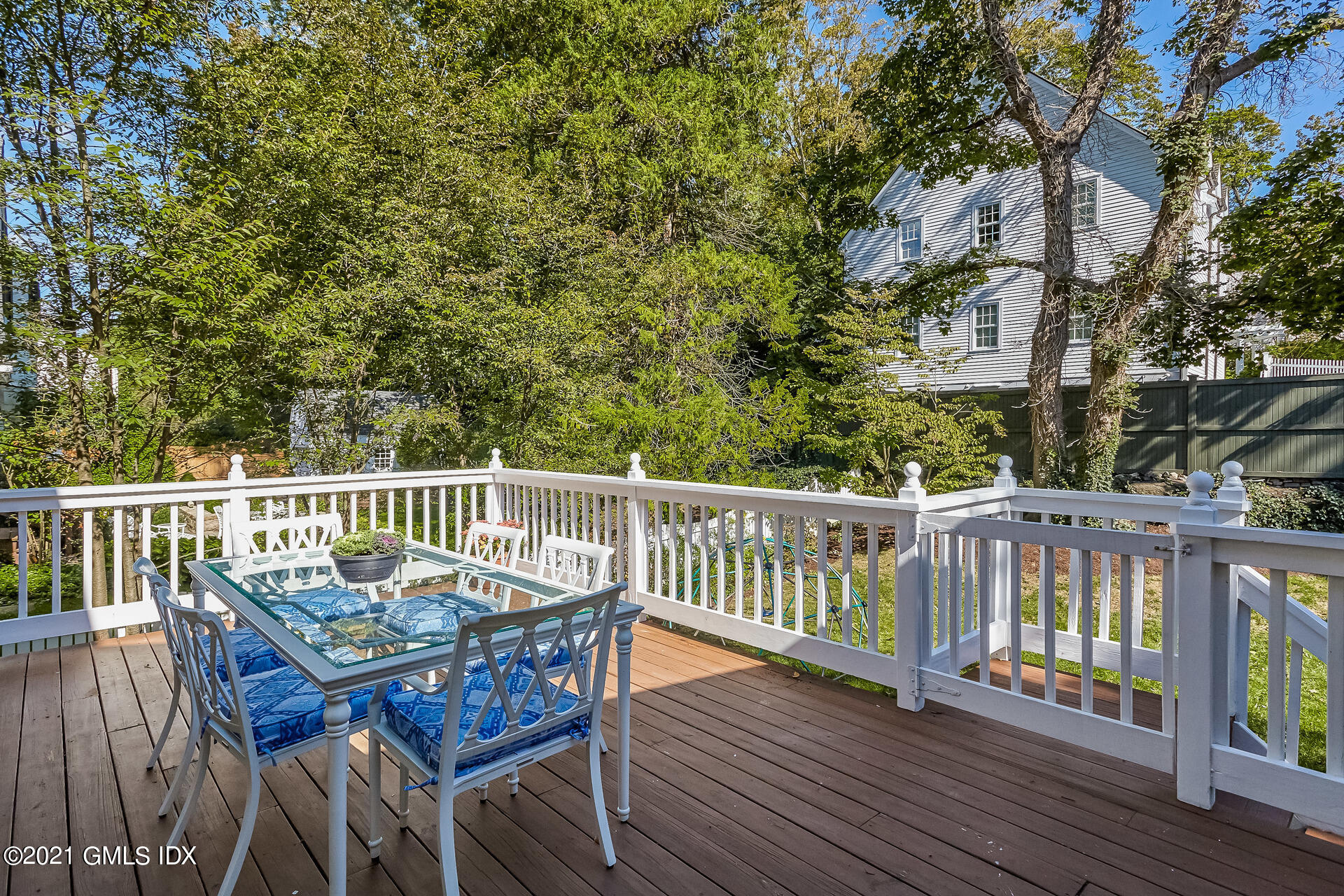 27 Perryridge Road Greenwich, CT 06830 - Photo 18 of 24 a view of a deck with furniture and wooden floor