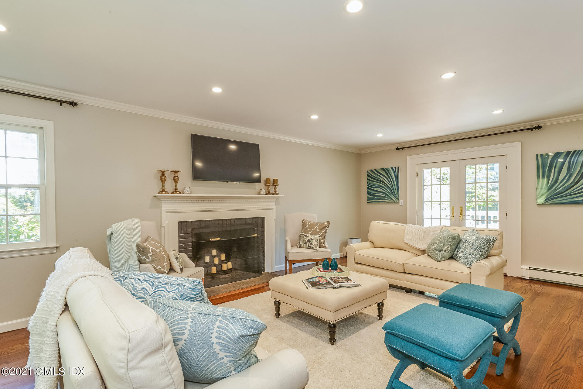 27 Perryridge Road Greenwich, CT 06830 - Photo 3 of 24 a living room with furniture fireplace and window