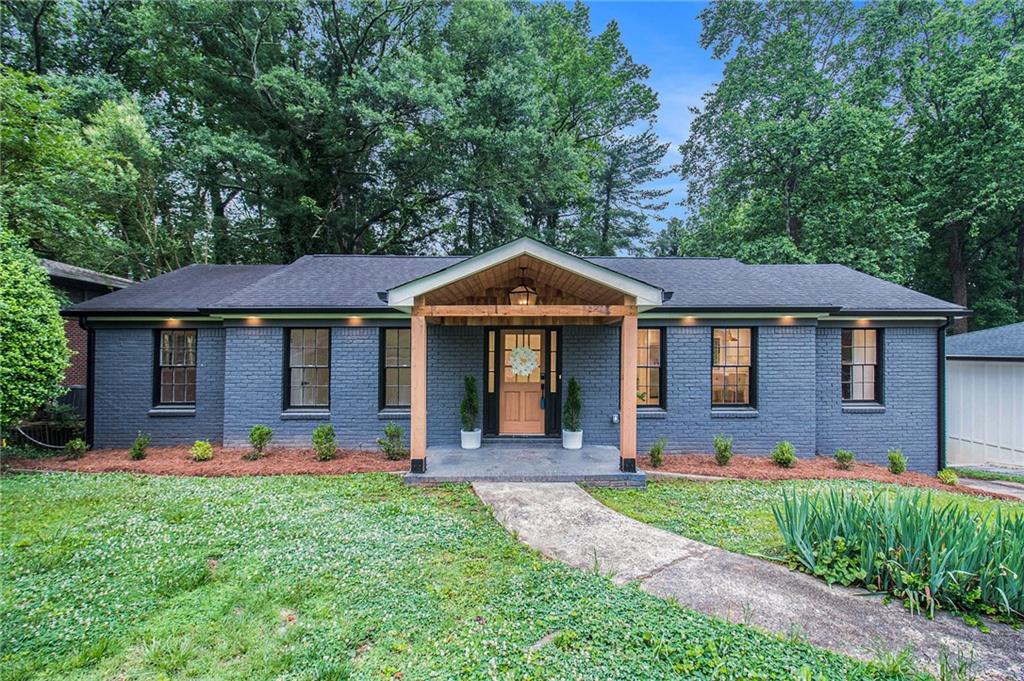 3175 Thrasher Circle Decatur, GA 30032 - Photo 1 of 1 a front view of a house with garden