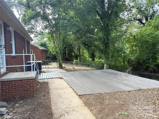 a view of outdoor space deck and tree
