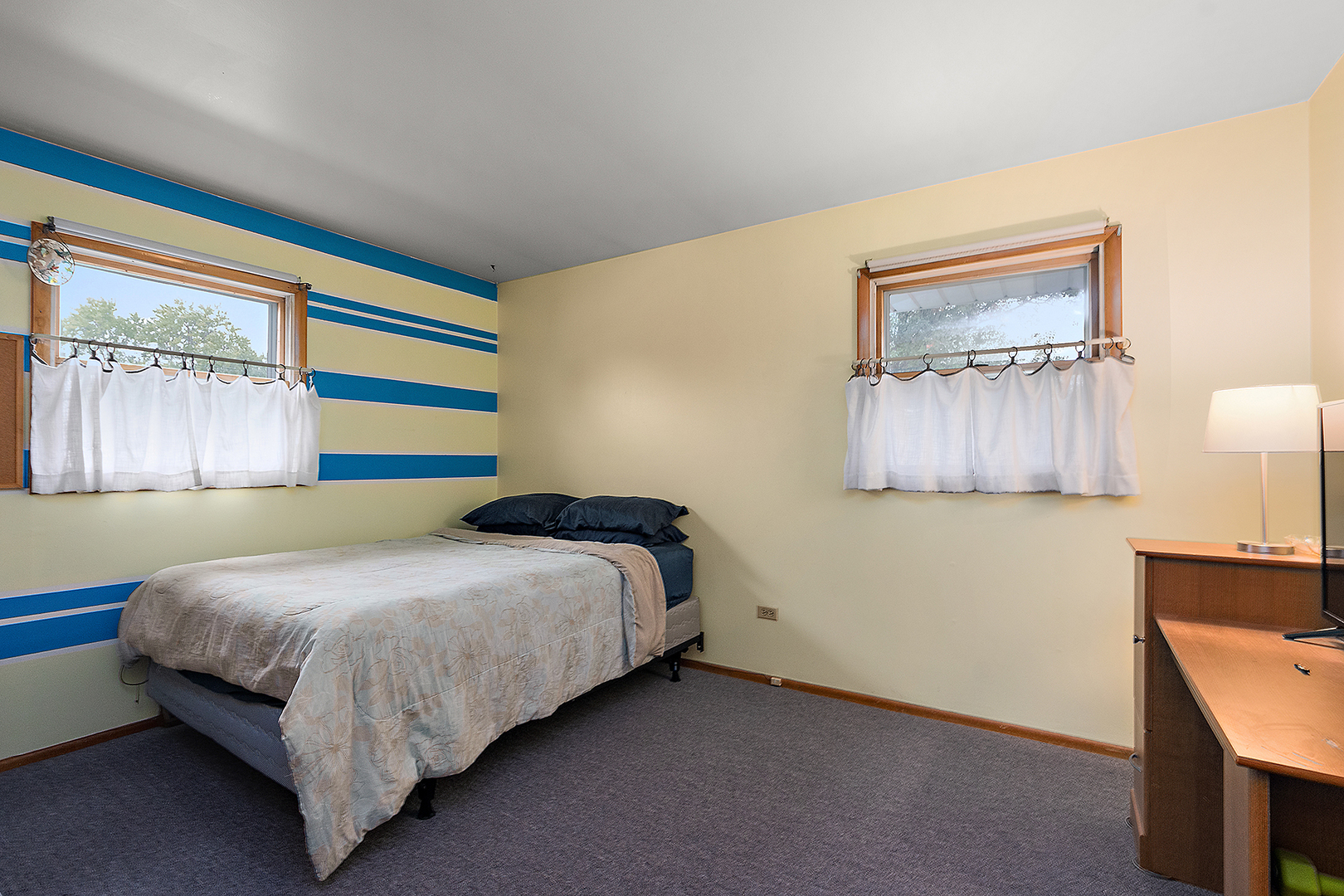 2924 192nd Place Lansing, IL 60438 - Photo 17 of 33 a bedroom with a bed and a cabinets