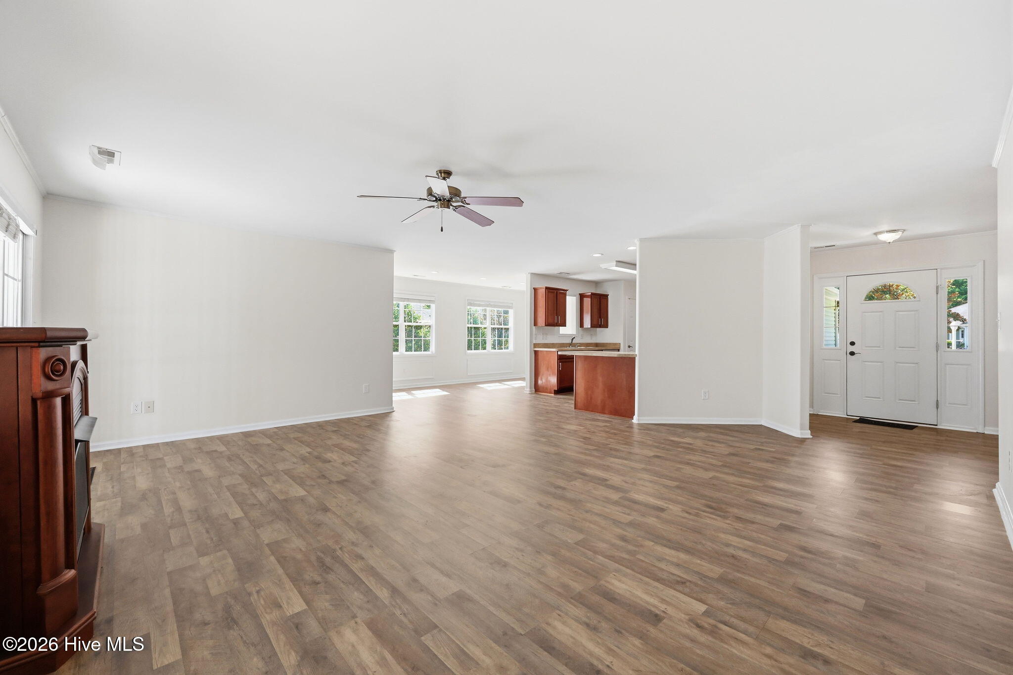 702 Hummingbird South Swansboro, NC 28584 - Photo 12 of 34 Living room looking into kitchen and dining