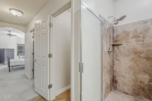 a bathroom with a shower and a tub