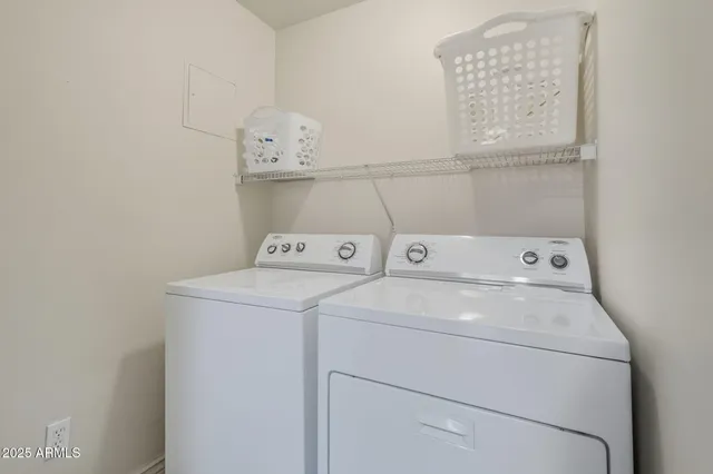 a utility room with dryer and washer