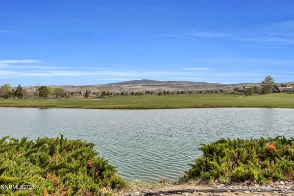 a view of a lake with a city view