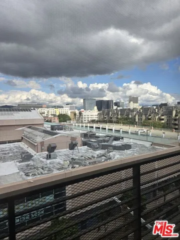 a bath tub sitting in a bathroom next to a window