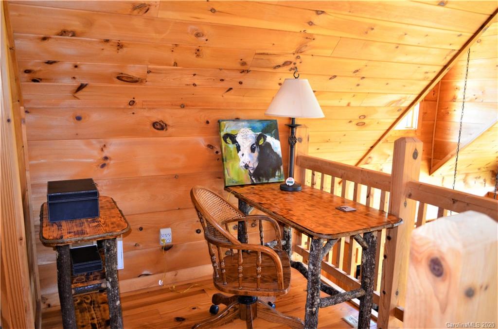208 Loblolly Ln Mill Spring Mill Spring, NC 28756 - Photo 23 of 46 a view of a balcony with chairs