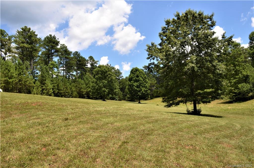 208 Loblolly Ln Mill Spring Mill Spring, NC 28756 - Photo 35 of 46 a view of outdoor space with trees