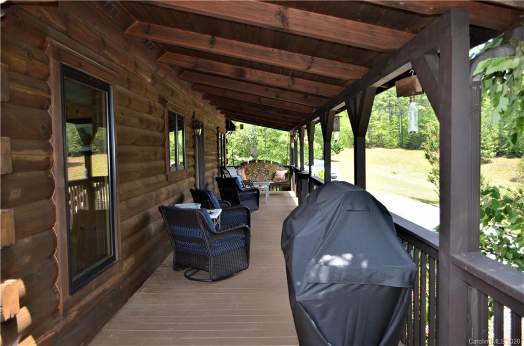 208 Loblolly Ln Mill Spring Mill Spring, NC 28756 - Photo 5 of 46 a view of balcony with couch and chairs