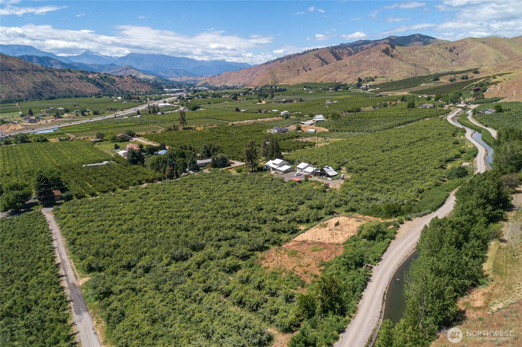 0 Red Apple Road Cashmere, WA 98815 - Photo 36 of 38 a view of a city with mountains in the background