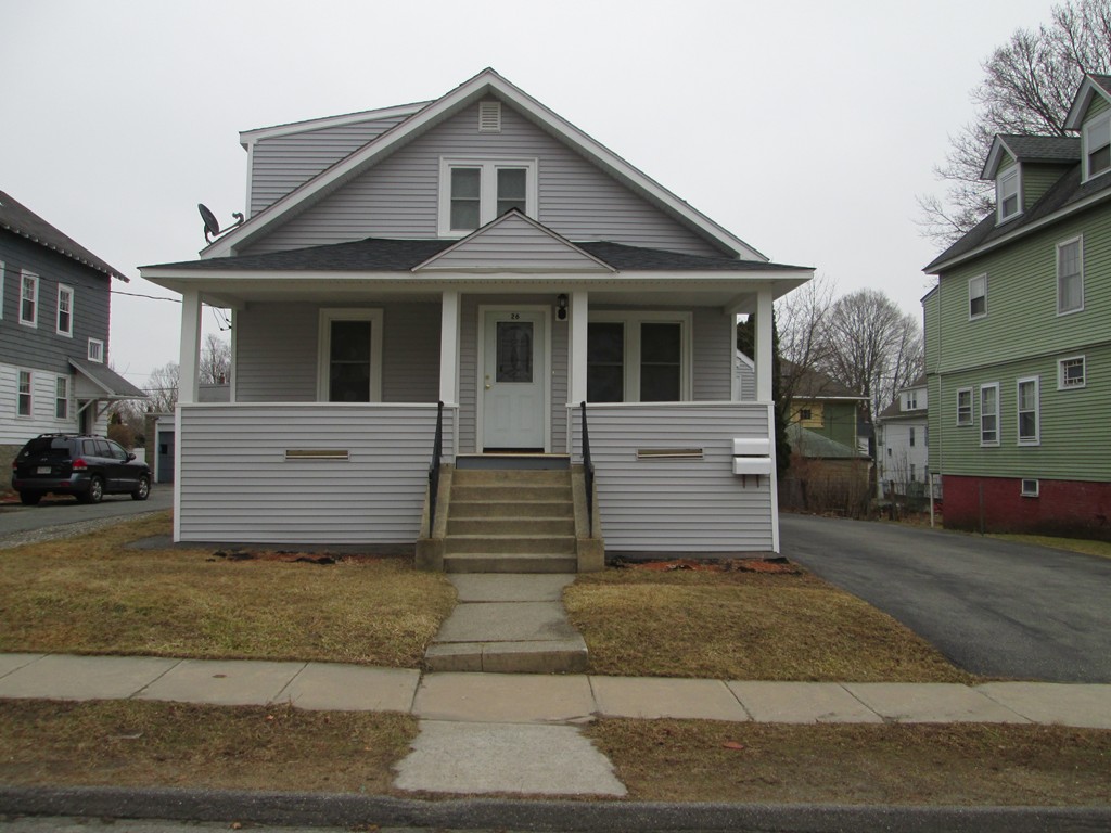 26 Sylvan Street Worcester, MA 01603 - Photo 2 of 27 a front view of a house with a yard