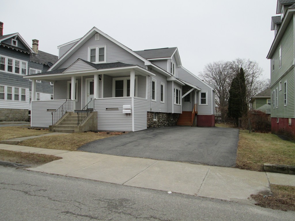 26 Sylvan Street Worcester, MA 01603 - Photo 3 of 27 a front view of a house with a yard