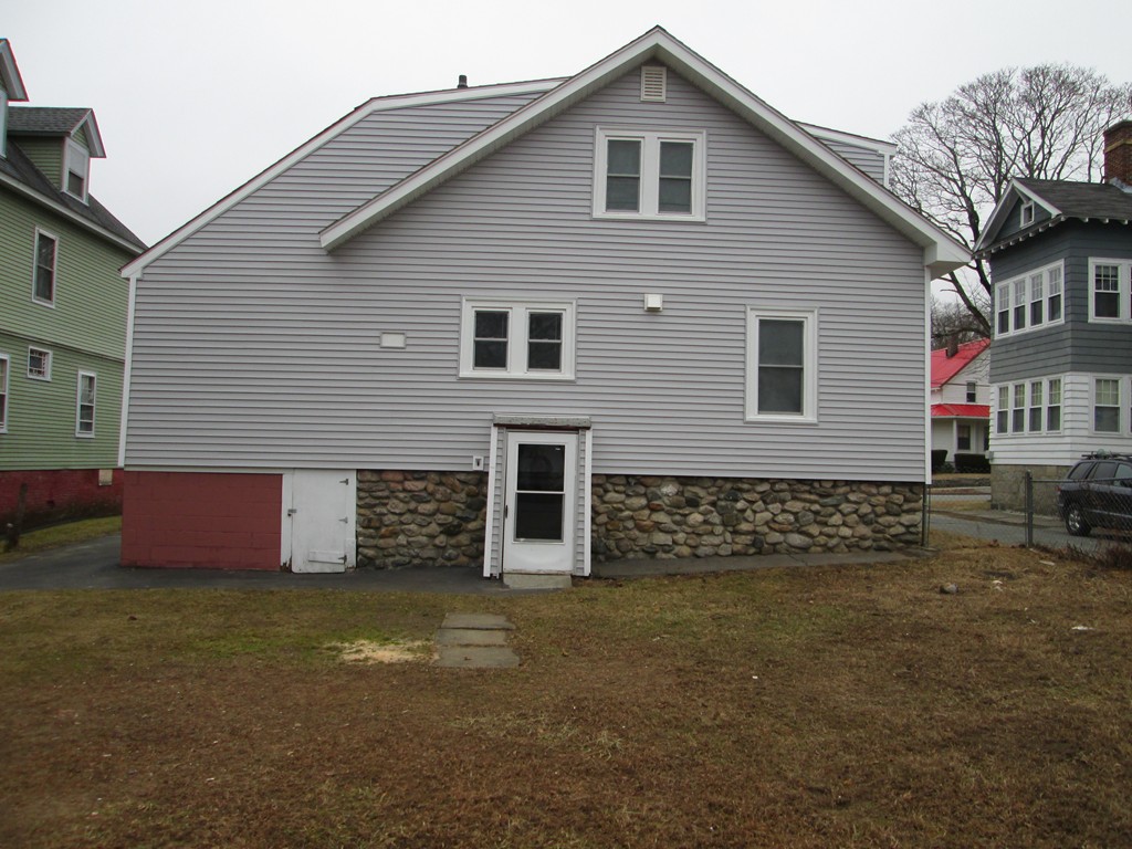 26 Sylvan Street Worcester, MA 01603 - Photo 4 of 27 a front view of a house with a yard