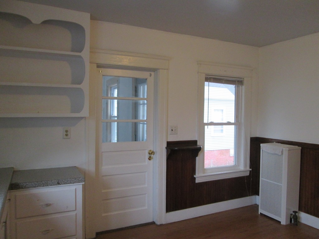 26 Sylvan Street Worcester, MA 01603 - Photo 10 of 27 a view of walk in closet with empty racks