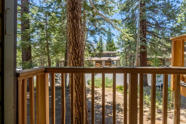 a view of balcony with trees