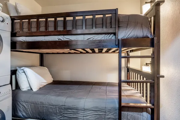 a view of bedroom with a wooden floor