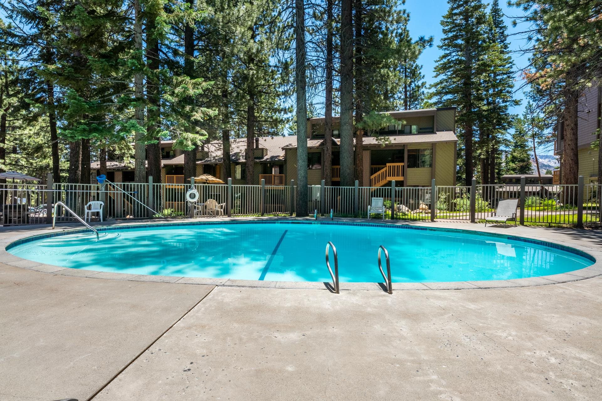 152 Viewpoint Road, Unit 115 Mammoth Lakes, CA 93546 - Photo 32 of 45 a view of backyard with swimming pool