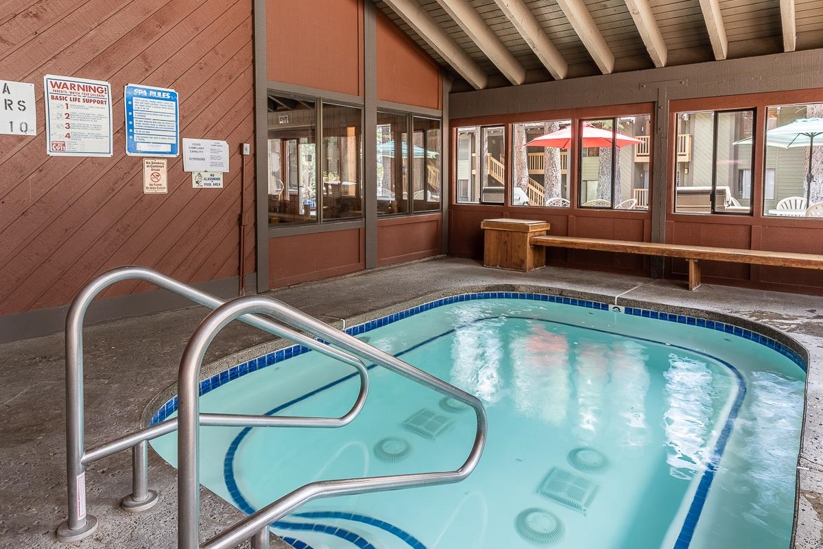 152 Viewpoint Road, Unit 115 Mammoth Lakes, CA 93546 - Photo 34 of 45 a view of a swimming pool with a potted plant