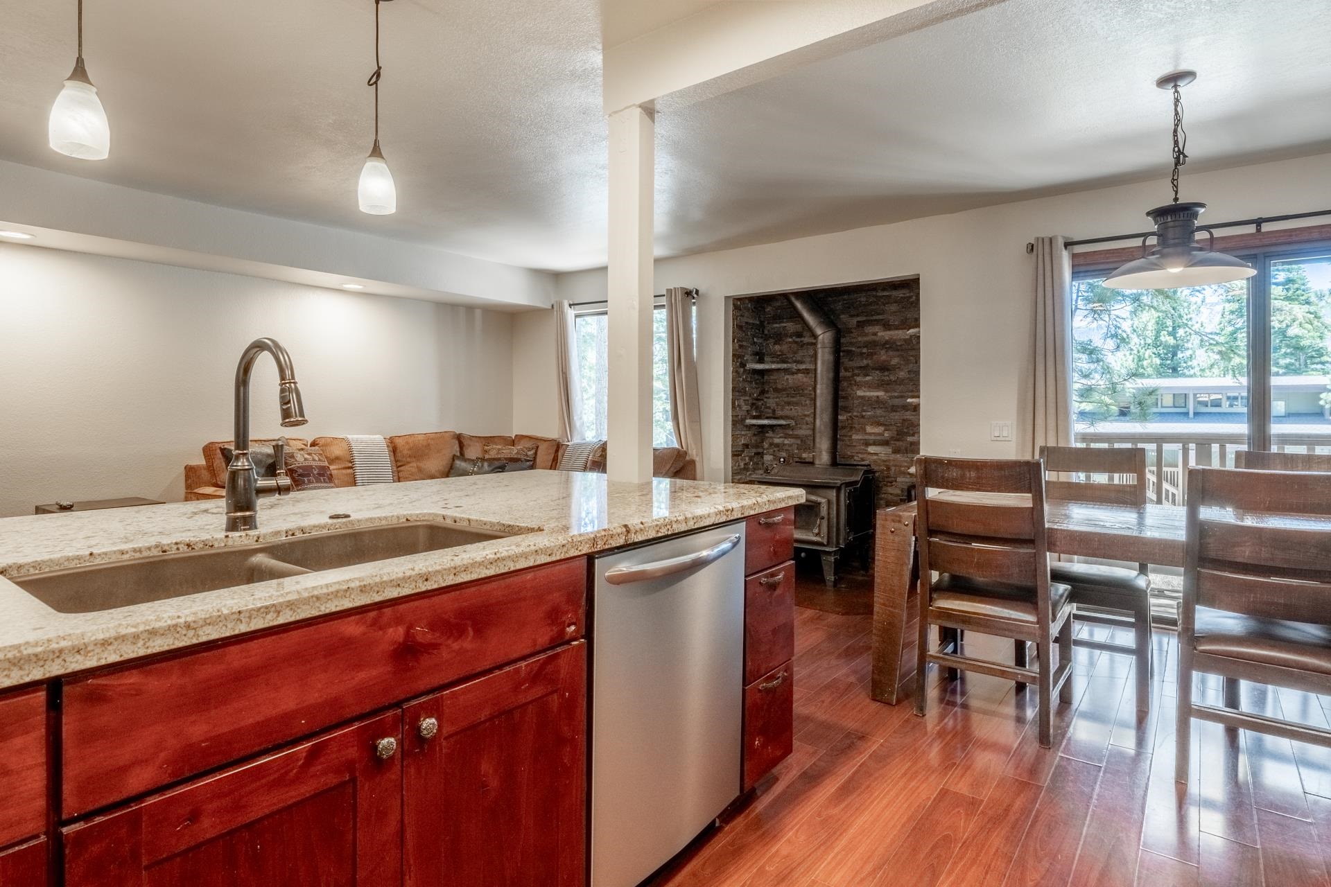 152 Viewpoint Road, Unit 115 Mammoth Lakes, CA 93546 - Photo 7 of 45 a kitchen with lots of counter top space and dining table