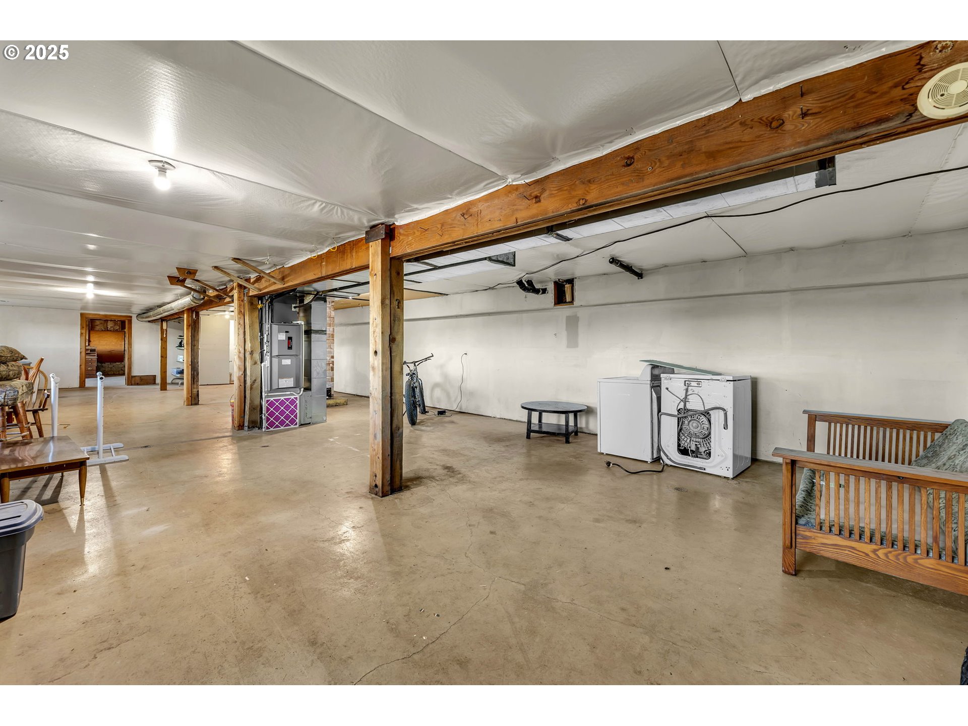39904 Northeast Rotschy Road Yacolt, WA 98675 - Photo 34 of 48 a view of a livingroom with a staircase