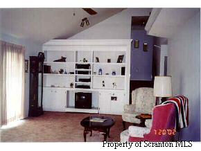 0 Bunnel Hill Road Meshoppen, PA 18630 - Photo 4 of 4 a living room with furniture and a flat screen tv