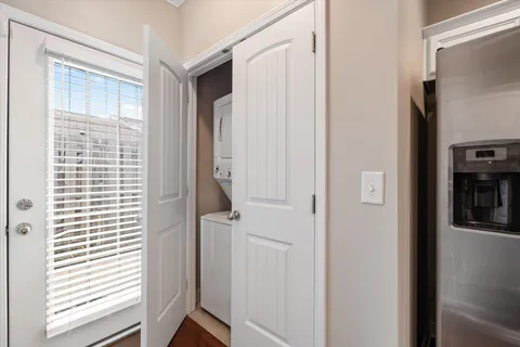 a view of walk in closet with window