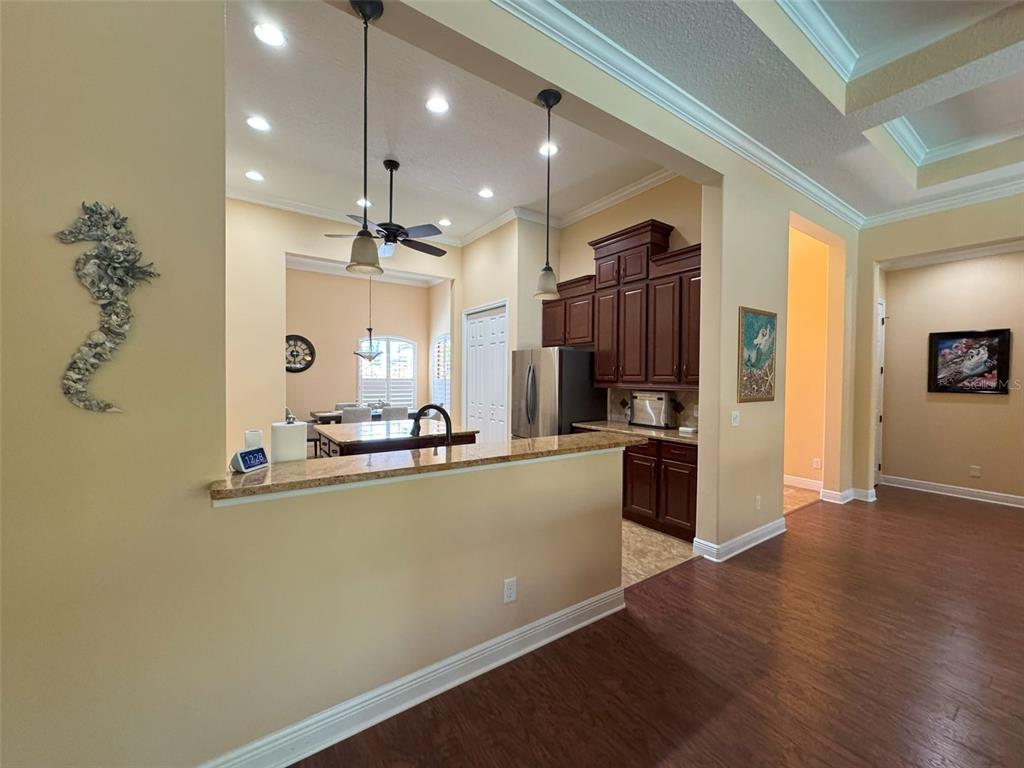 1024 West Beagle Run Loop Hernando, FL 34442 - Photo 14 of 44 a kitchen with stainless steel appliances a refrigerator and a stove top oven