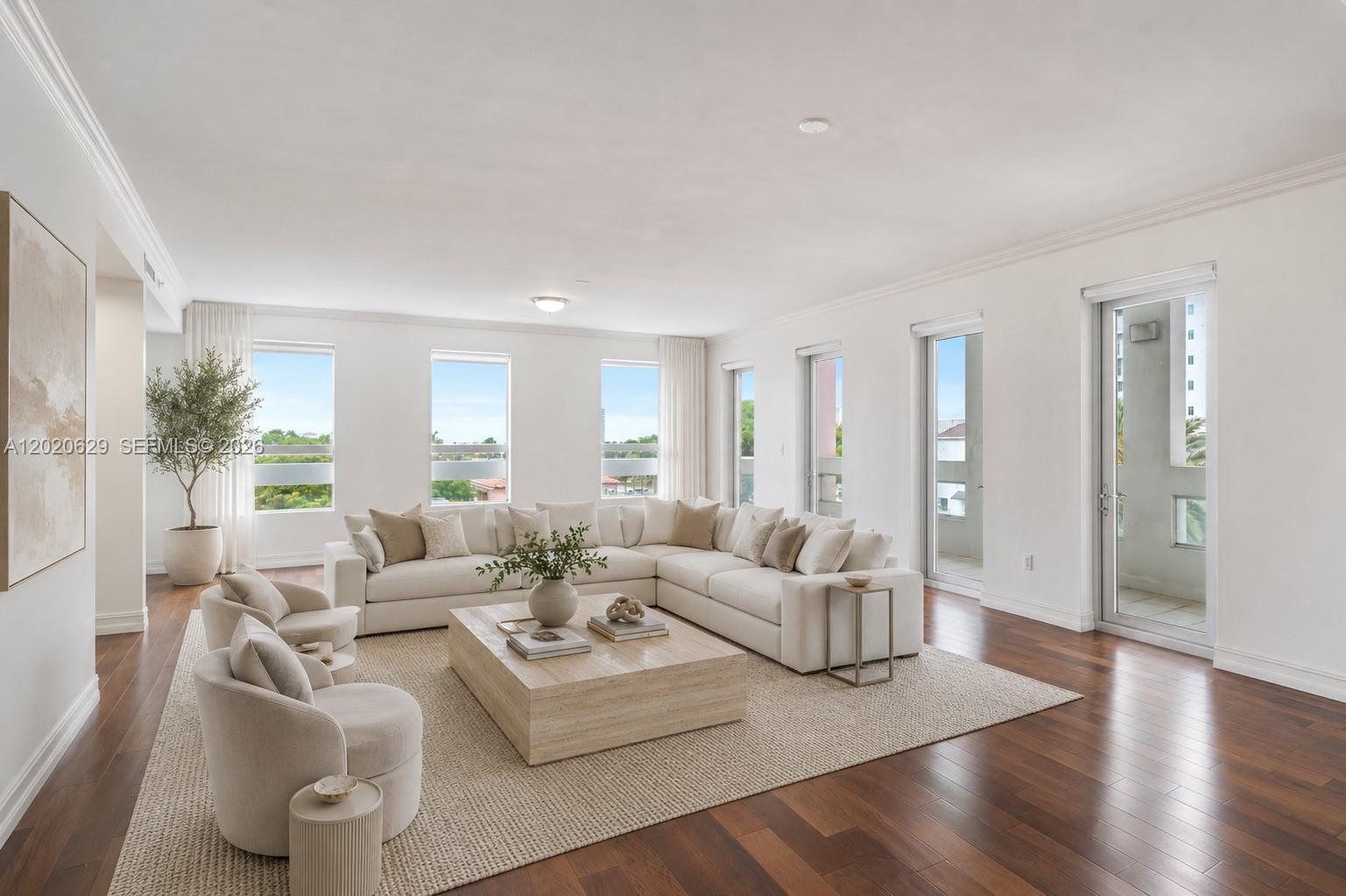 455 East Palmetto Park Road, Unit 4 Boca Raton, FL 33432 - Photo 1 of 30 a living room with furniture wooden floor and a large window