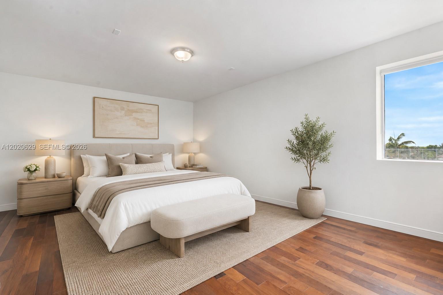 455 East Palmetto Park Road, Unit 4 Boca Raton, FL 33432 - Photo 12 of 30 a bedroom with bed and a potted plant