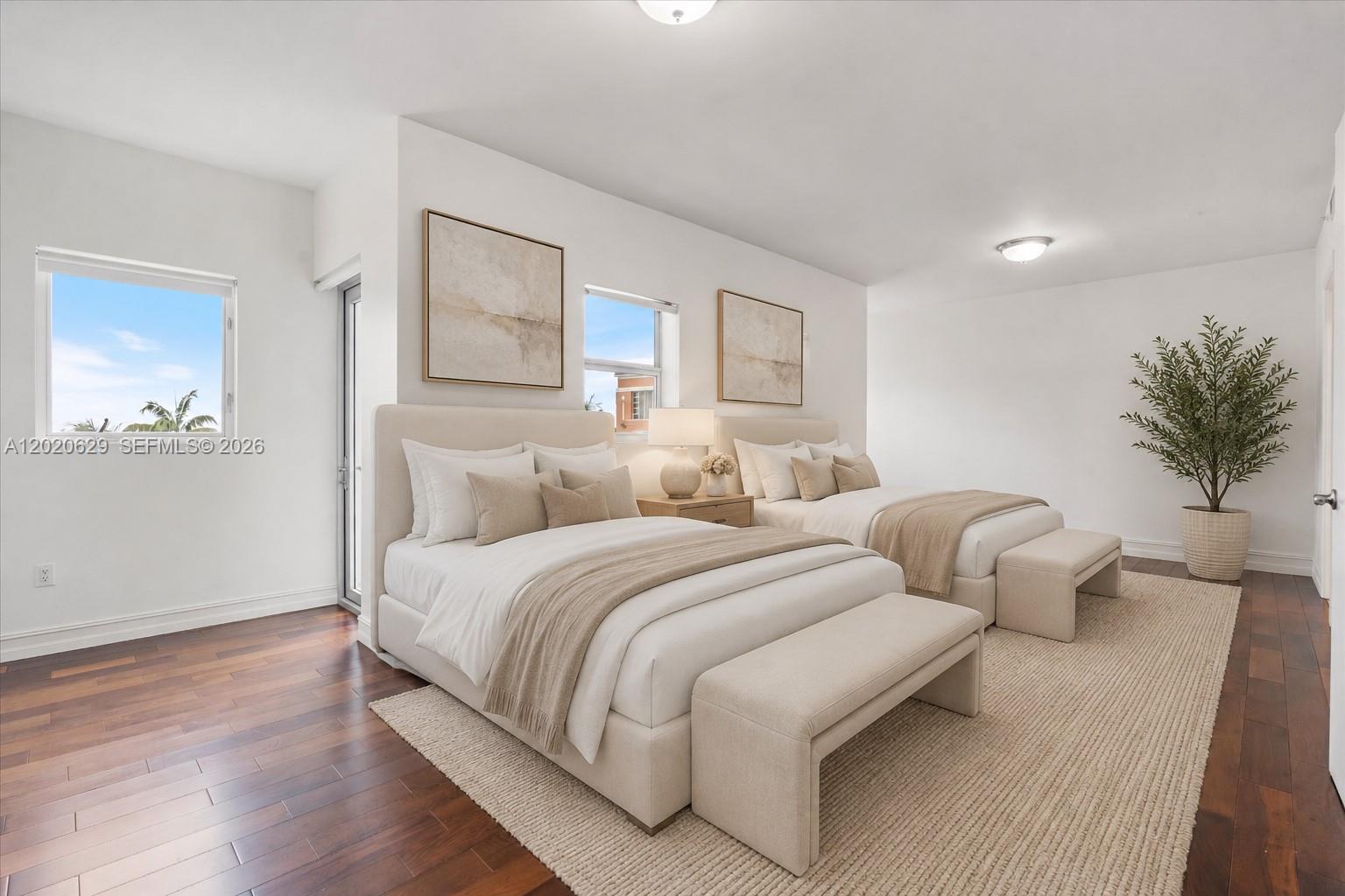 455 East Palmetto Park Road, Unit 4 Boca Raton, FL 33432 - Photo 19 of 30 a bed room with bed and a couch